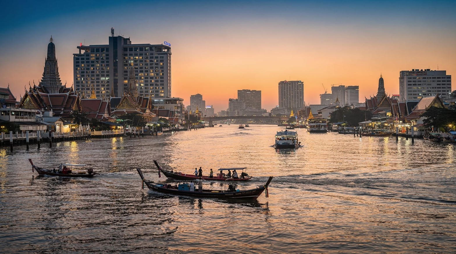 The Chao Phraya at dusk — the long way home after UOB LIVE
