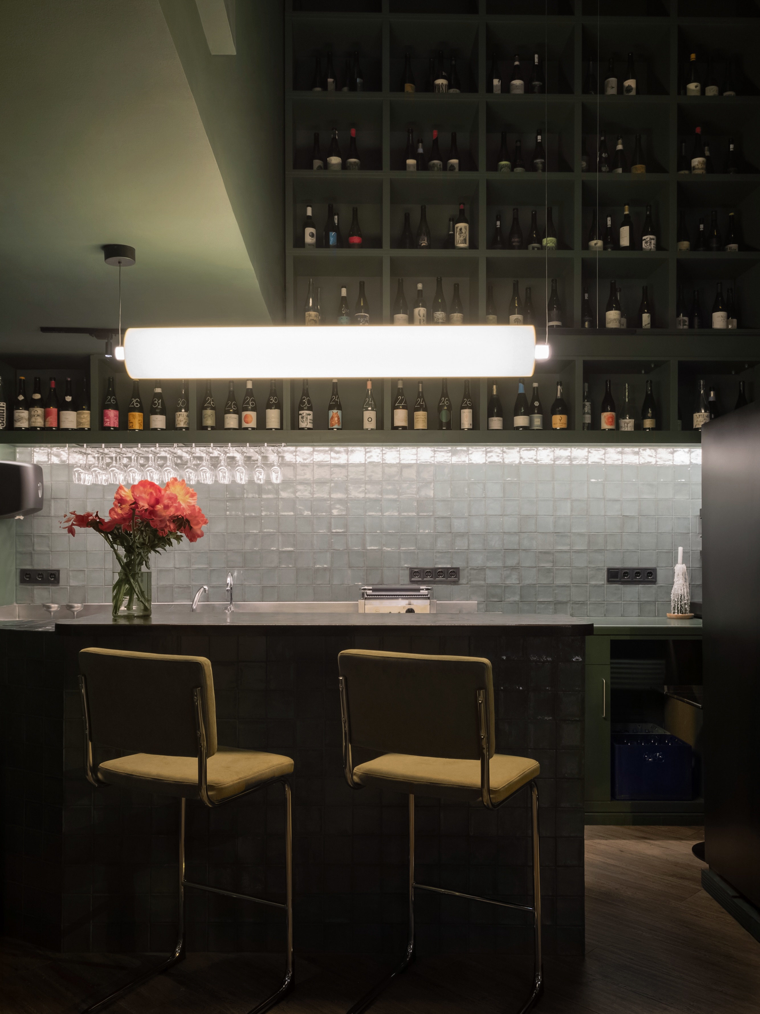 Mosaic floor and bottles at Salut Bar