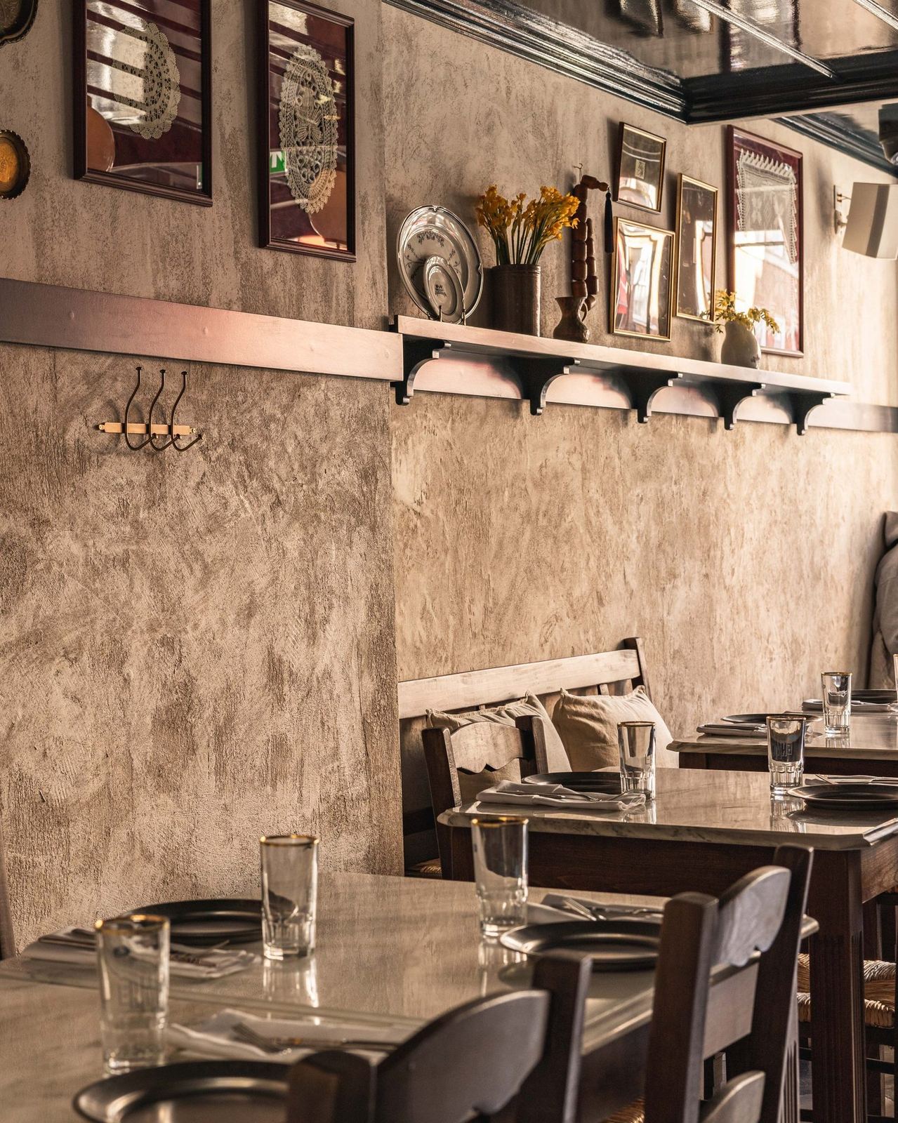 Rush chairs and plaster walls at Taverna Ermou on James Street
